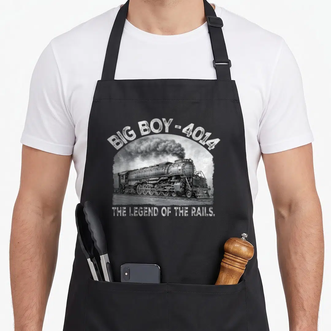 Engine locomotive railroad apron - Distressed grey and white steam locomotive 4014 with arched text reading Big Boy — shown on a black cotton canvas apron against a white background