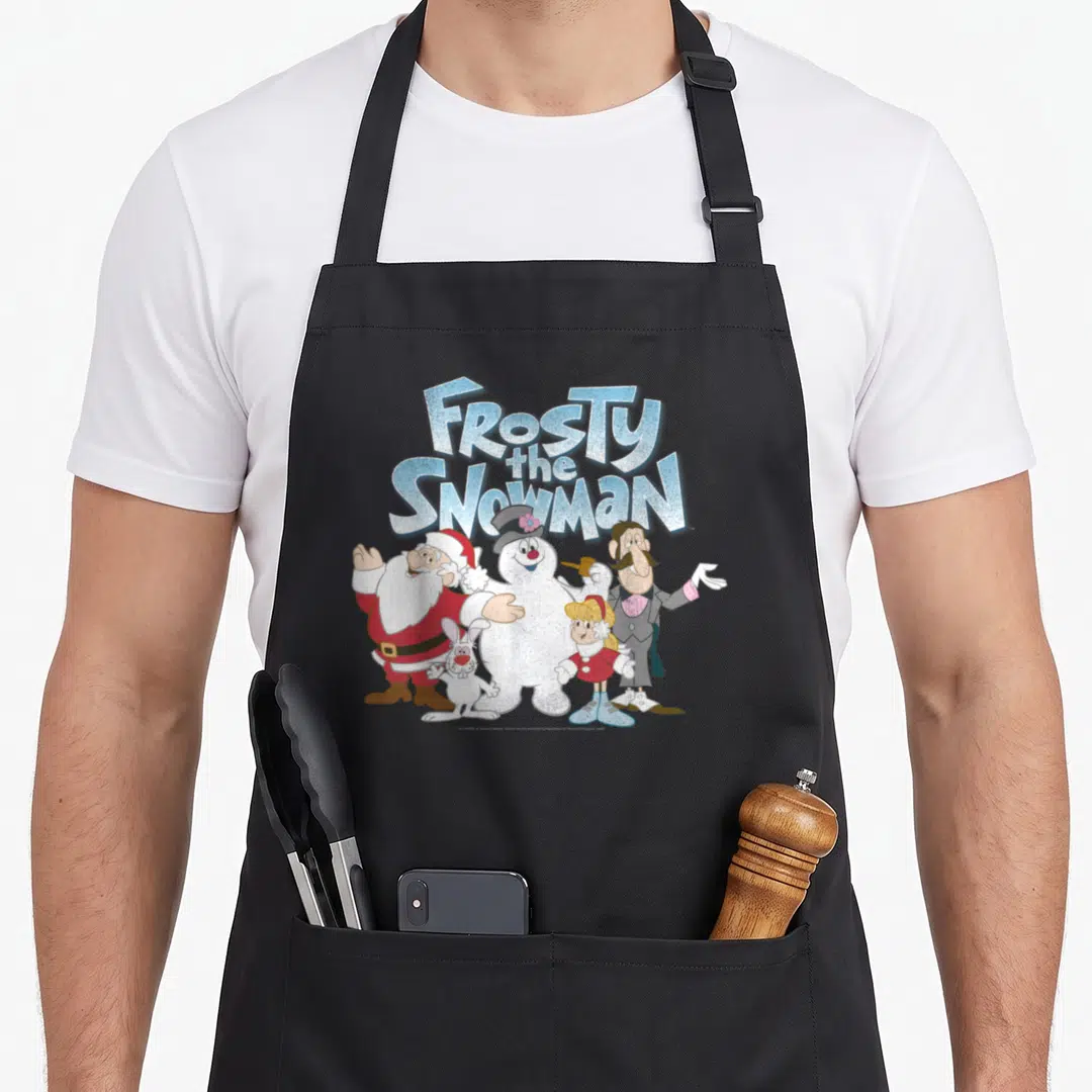 Shot snowman apron - Frosty the Snowman text above Santa, man, girl, and rabbit in cartoon style — shown on a black cotton canvas apron against a white background