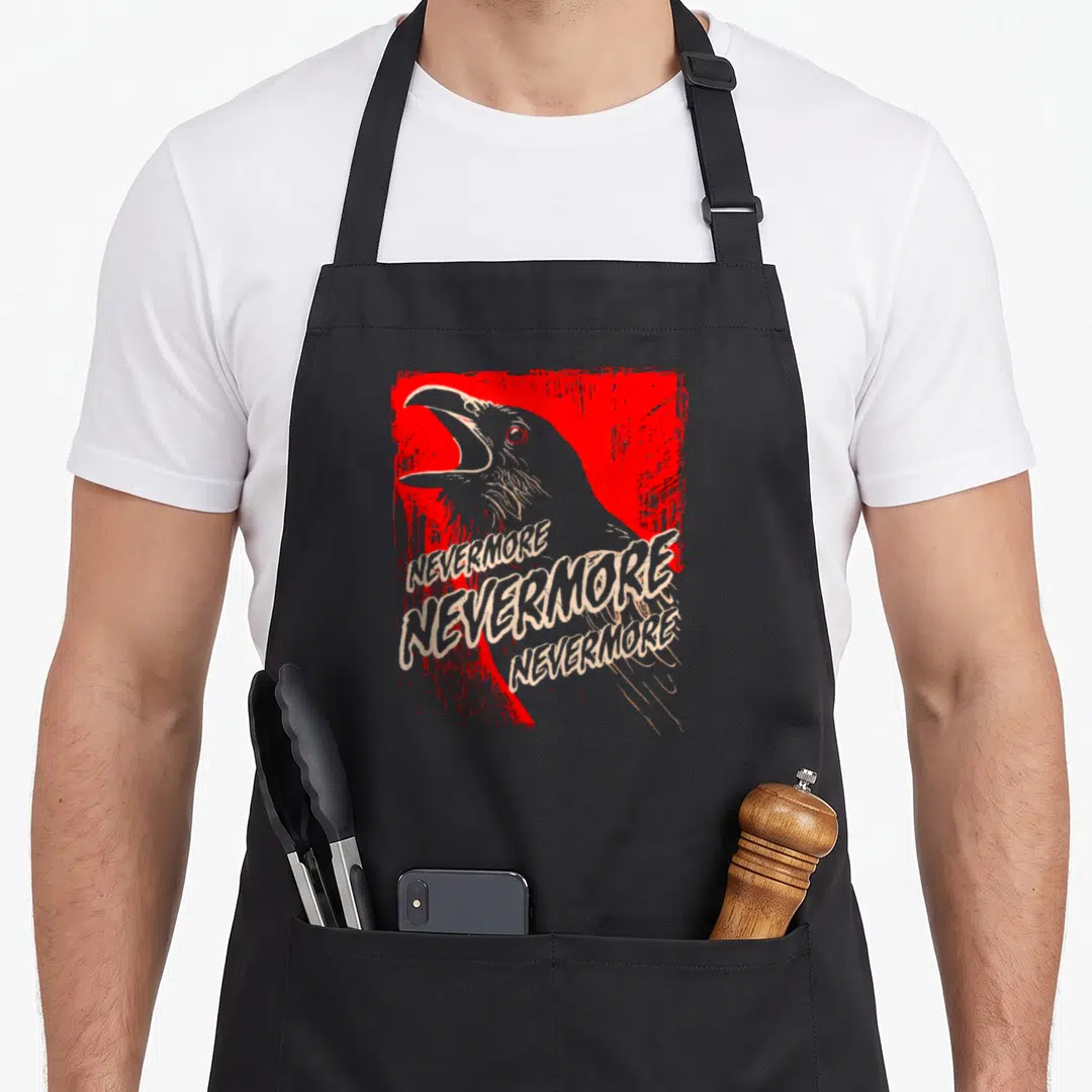 Gasp gothic apron - Raven head with three stacked NEVERMORE texts on distressed red background — shown on a black cotton canvas apron against a white background