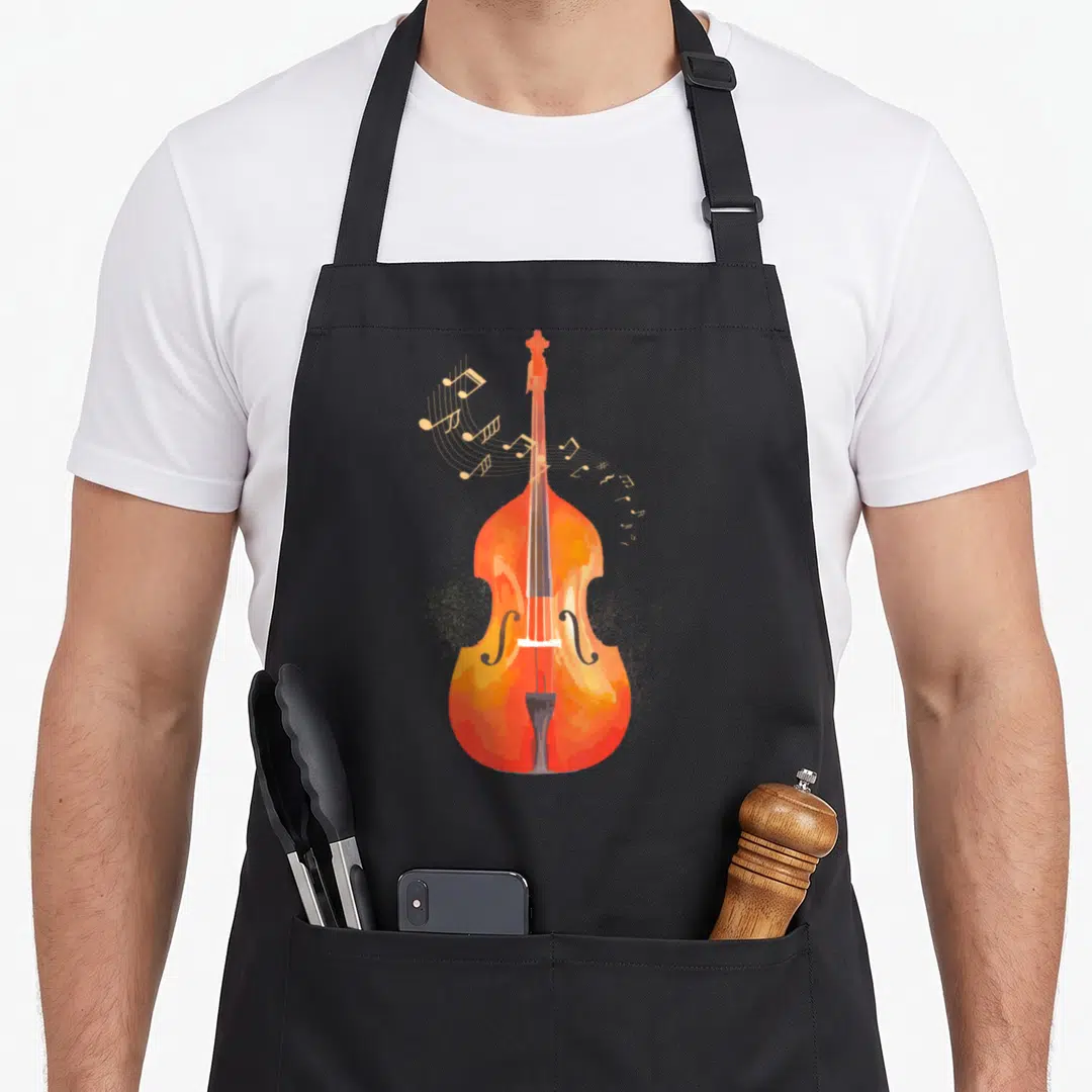 Classical double apron - Watercolor cello in orange and red with musical notes flowing from the left side — shown on a black cotton canvas apron against a white background