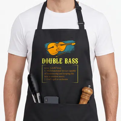 Contrabass double apron - Orange double bass over blue brushstroke with yellow dictionary definition text — shown on a black cotton canvas apron against a white background