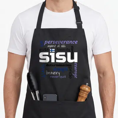 Definition finnish apron - SISU typography collage with Finnish flag and words grit perseverance tenacity — shown on a black cotton canvas apron against a white background