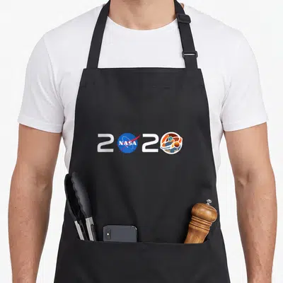 Jpl nasa apron - 2020 typography with NASA logo and Mars mission emblem in white blue orange — shown on a black cotton canvas apron against a white background
