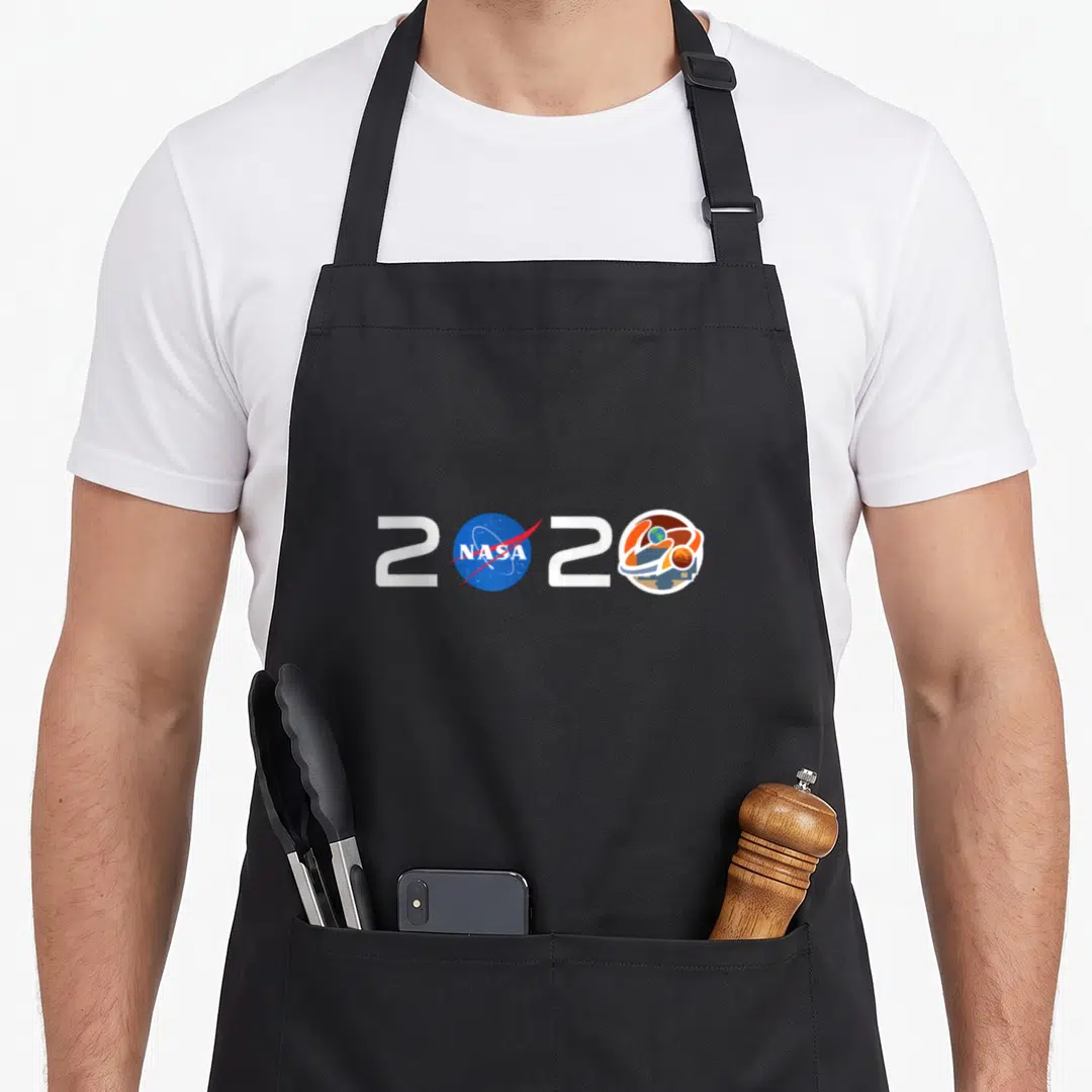 Jpl nasa apron - 2020 typography with NASA logo and Mars mission emblem in white blue orange — shown on a black cotton canvas apron against a white background