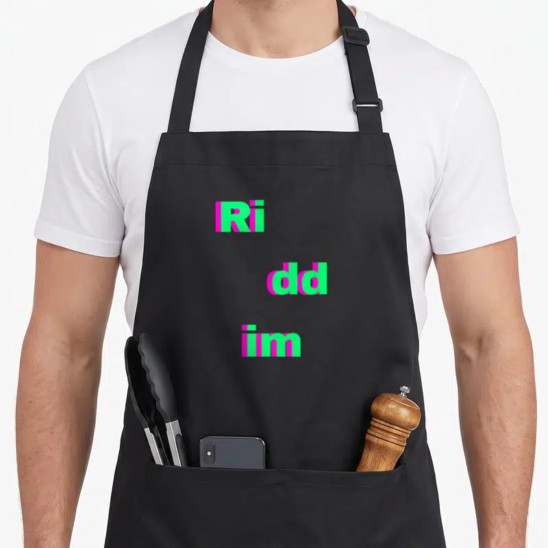 Riddim dubstep apron - Stacked green and magenta text Ri dd im with diagonal lines — shown on a black cotton canvas apron against a white background