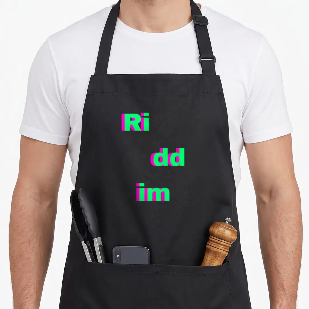 Riddim dubstep apron - Stacked green and magenta text Ri dd im with diagonal lines — shown on a black cotton canvas apron against a white background