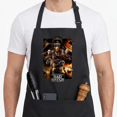 Batch novelty apron - Clone trooper group pyramid with spaceship planet and The Bad Batch logo text — shown on a black cotton canvas apron against a white background