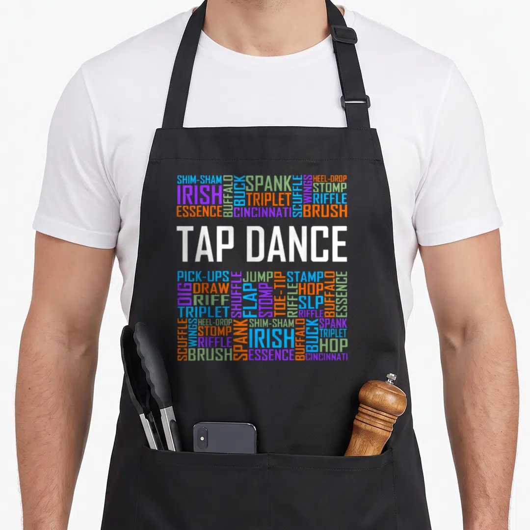 Tap teacher apron - Typography art listing tap dance moves like shim-sham, triplet, and heel-drop in multicolor block — shown on a black cotton canvas apron against a white background