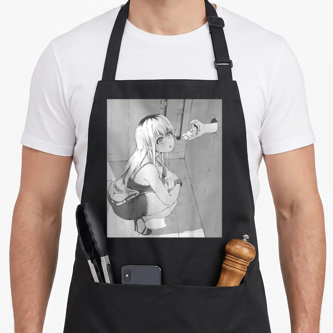Presser anime apron - Manga woman crouching in room with hand reaching through wall hole — shown on a black cotton canvas apron against a white background