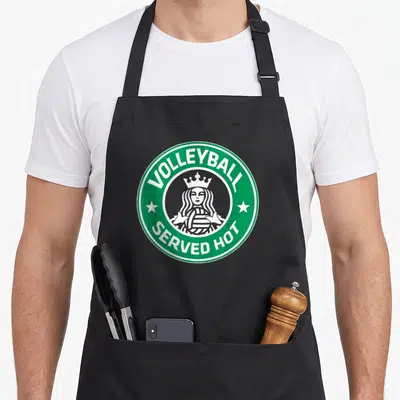 Served volleyball serve apron - Green circular emblem with crowned woman holding volleyball and white text — shown on a black cotton canvas apron against a white background
