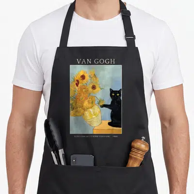 Cat van gogh apron - Black cat reaching for yellow sunflowers in a vase under Van Gogh text label — shown on a black cotton canvas apron against a white background