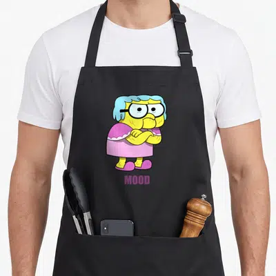Mood alice apron - Cartoon character with blue hair and crossed arms above purple MOOD text — shown on a black cotton canvas apron against a white background