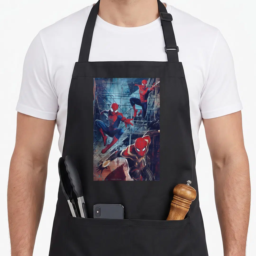 Way terrible apron - Three Spider-Men leaping and crouching on grey scaffolding in red and blue suits — shown on a black cotton canvas apron against a white background