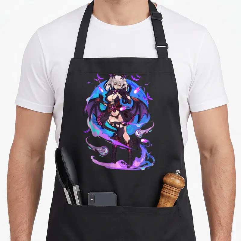 Demon kawaii cooking apron - Cartoon demon girl with purple energy swirls, pink orbs, and black bat wings — shown on a black cotton canvas apron against a white background