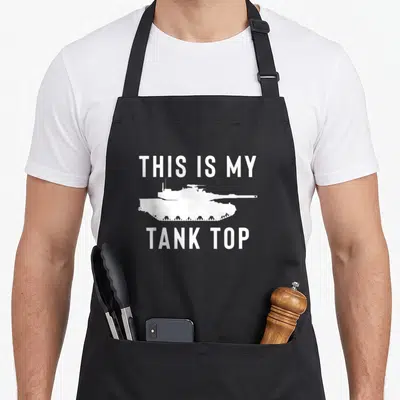 Abram military apron - White tank silhouette between THIS IS MY TANK TOP text — shown on a black cotton canvas apron against a white background