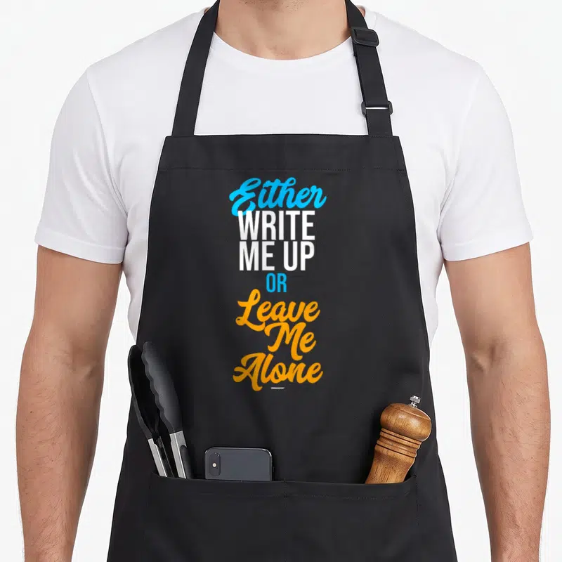Swagazon snarky aprons - Stacked blue white and orange text reading Either WRITE ME UP OR Leave Me Alone — shown on a black cotton canvas apron against a white background