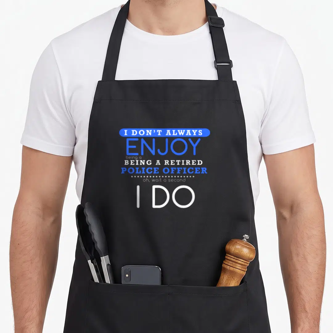 Officer military apron - Blue and white stacked typography reading I don't always enjoy being a retired police officer — shown on a black cotton canvas apron against a white background