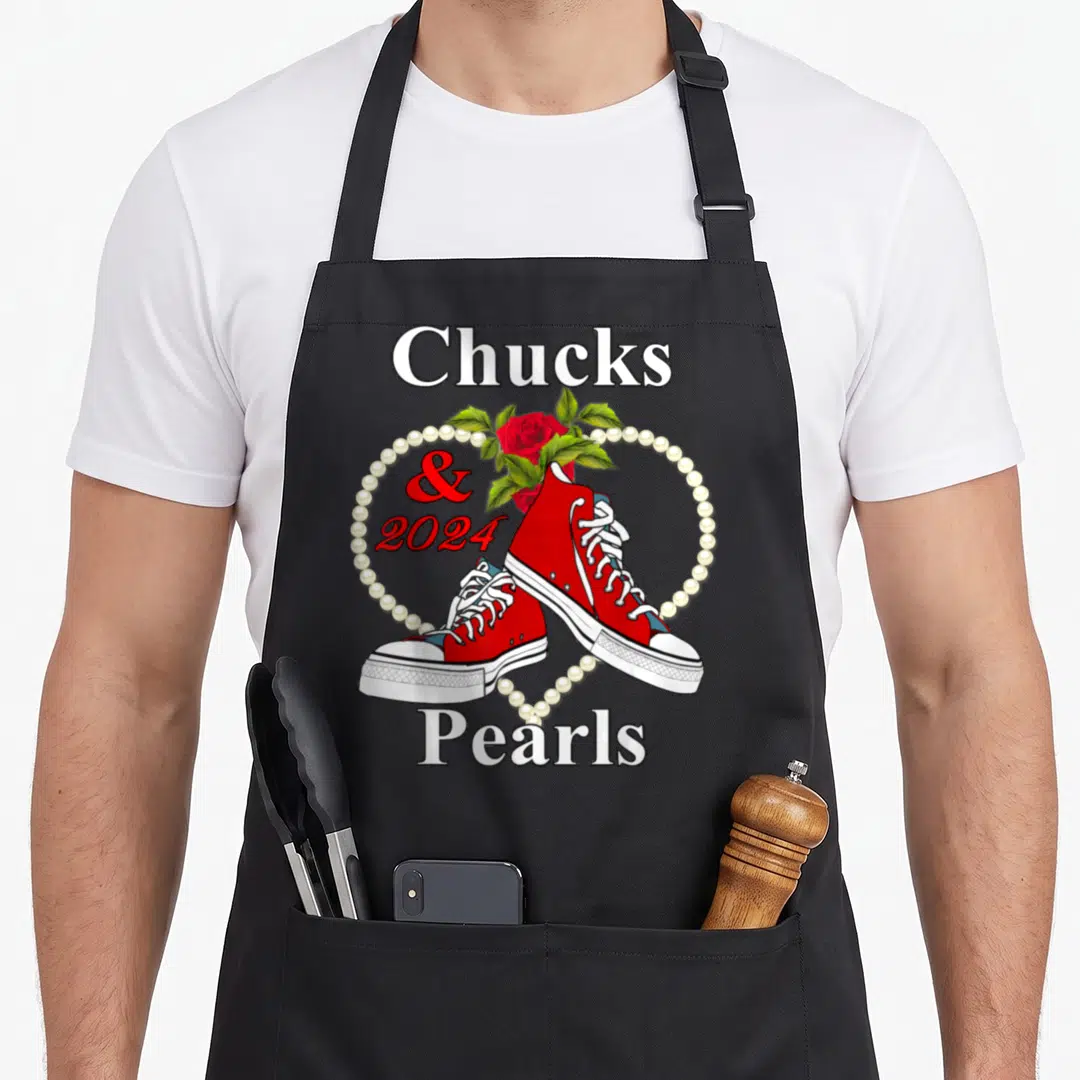 Afro floral apron - Red sneakers inside pearl heart with rose and Chucks 2024 Pearls text — shown on a black cotton canvas apron against a white background