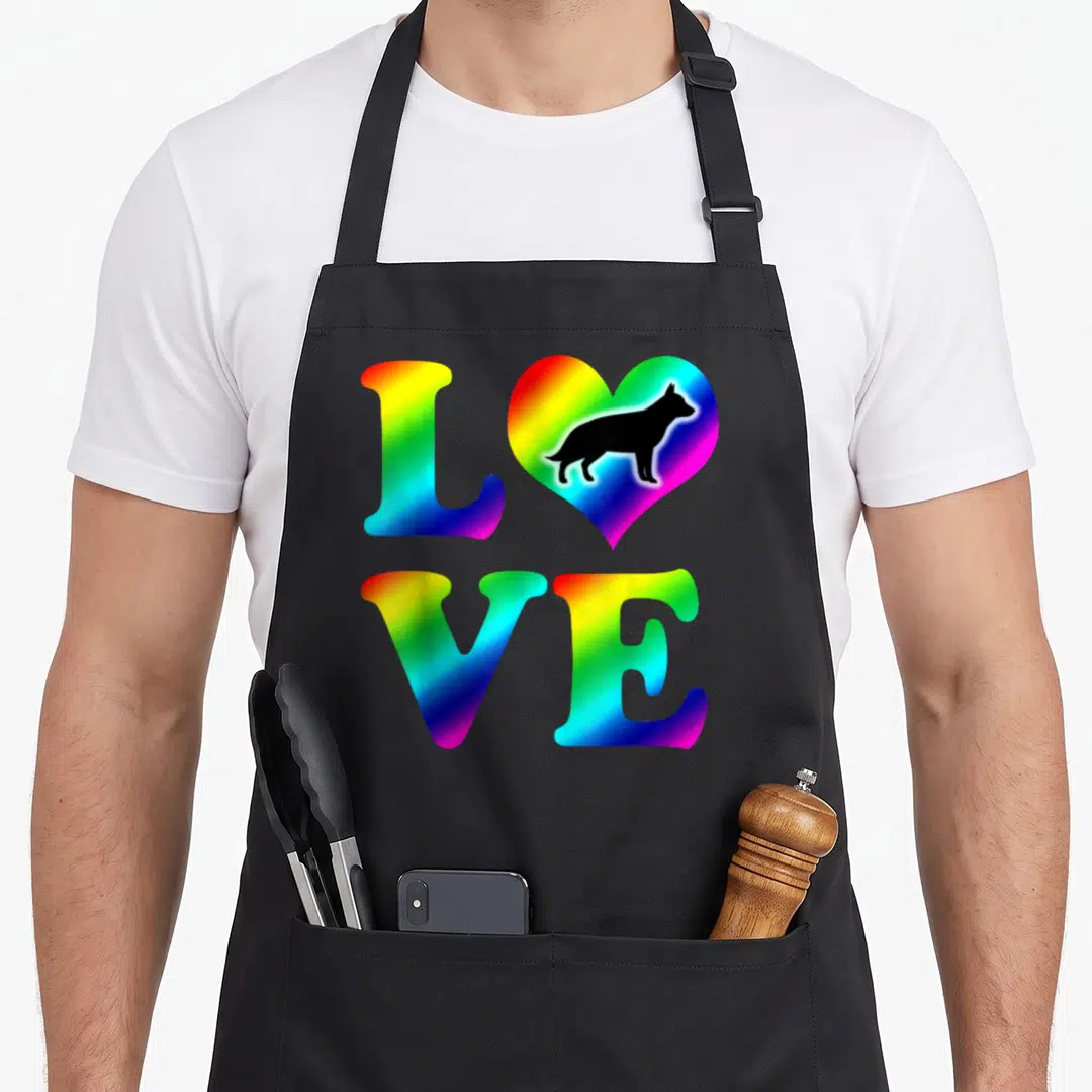 Rainbow german apron - Rainbow gradient LOVE text with heart containing black German Shepherd silhouette — shown on a black cotton canvas apron against a white background