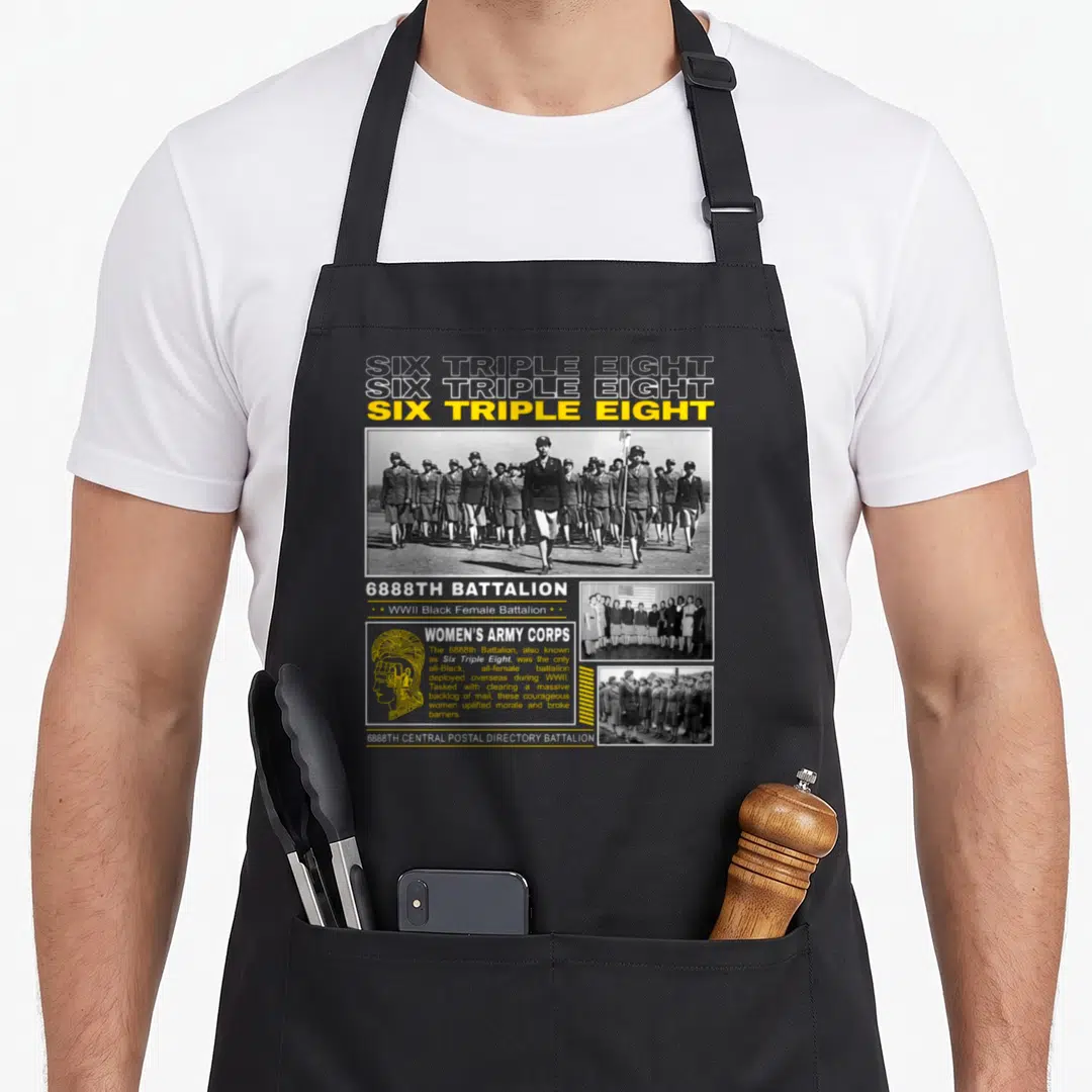 Six tribute apron - Stacked Six Triple Eight text above three WWII photos of women in uniform with Women's Army Corps — shown on a black cotton canvas apron against a white background