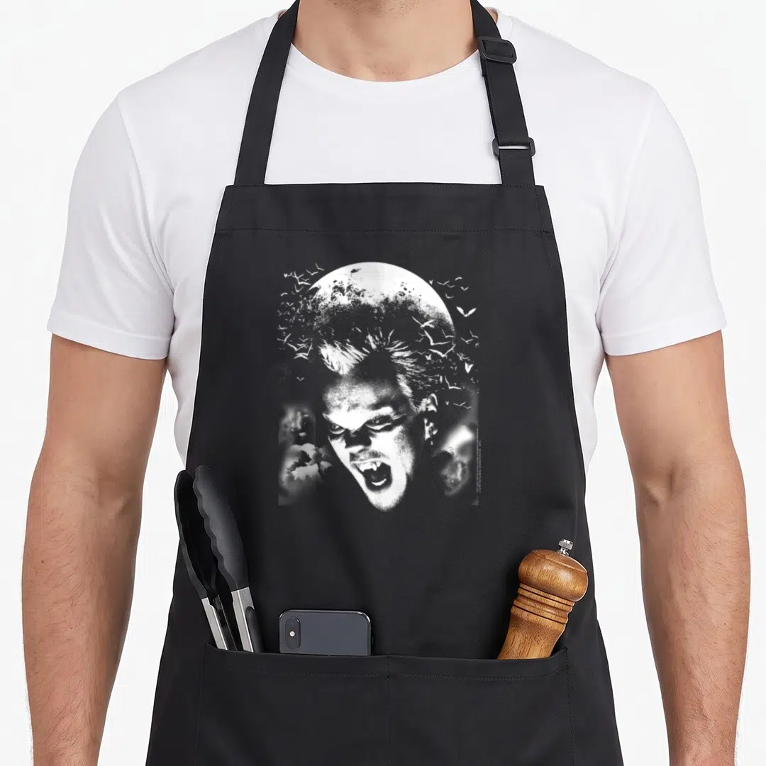 Lost david aprons - Distressed white vampire face centered before moon with scattered bats and clouds — shown on a black cotton canvas apron against a white background