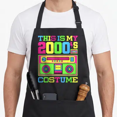 Costume hip apron - Colorful boombox with THIS IS MY 2000S COSTUME text in pink green yellow blue — shown on a black cotton canvas apron against a white background