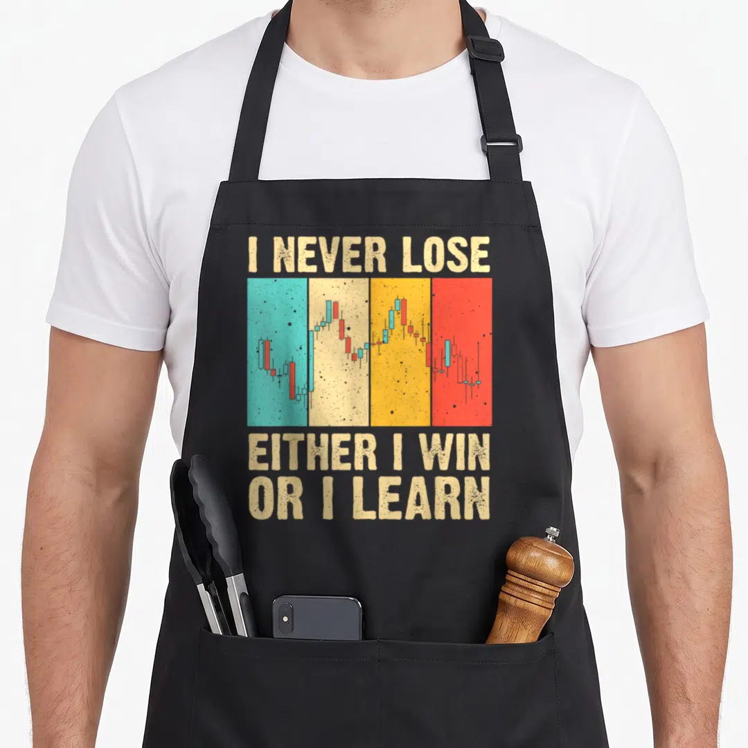 Market stock aprons - Retro candlestick chart on beige teal yellow red blocks with I Never Lose text — shown on a black cotton canvas apron against a white background