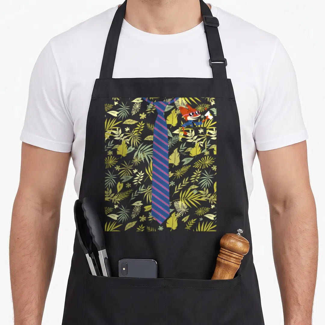Nick tie apron - Fox in pocket holding paper beside blue striped tie on leafy grey background — shown on a black cotton canvas apron against a white background