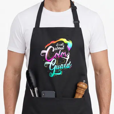 Member color guard apron - Rainbow flag flowing from performer with pink cyan yellow green blue white script text — shown on a black cotton canvas apron against a white background