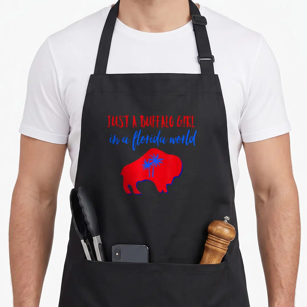 Buffalo florida apron - Red buffalo silhouette with blue palm trees and stacked red and blue text — shown on a black cotton canvas apron against a white background