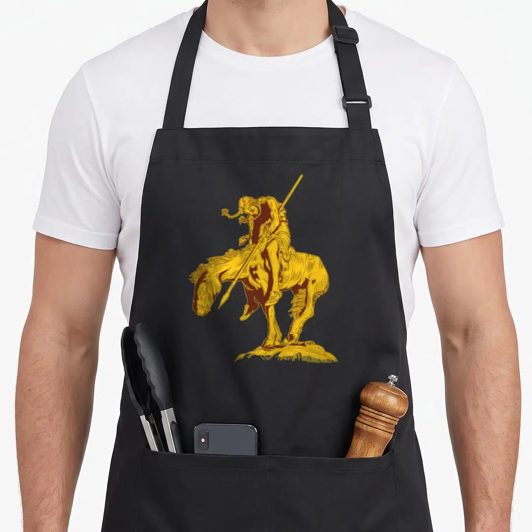 Trail native american apron - Gold line-art of a weary man on horseback holding a spear standing on ground — shown on a black cotton canvas apron against a white background