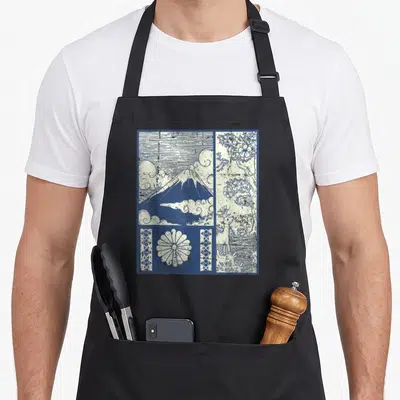 Cherry japan apron - Mount Fuji and cherry blossom line art with deer and flower emblem on black apron — shown on a black cotton canvas apron against a white background