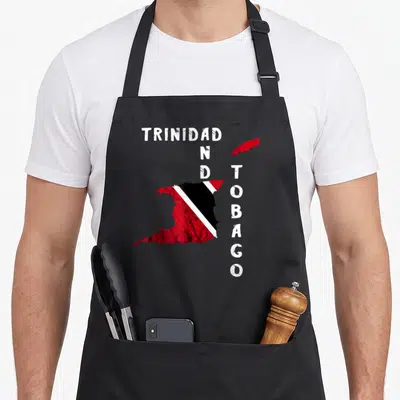 Trinidadian pride apron - Distressed map of Trinidad and Tobago filled with red black and white flag colors and split — shown on a black cotton canvas apron against a white background