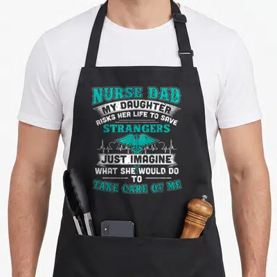 Daughter nurses apron - Nurse Dad text, teal caduceus, white heartbeat line, distressed style — shown on a black cotton canvas apron against a white background