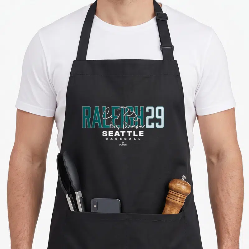 Raleigh baseball apron - Teal RALEIGH 29 text with white Big Dumpa script and Seattle Baseball logo — shown on a black cotton canvas apron against a white background