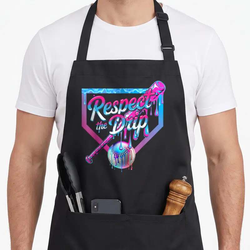 Baseball ice cream apron - Respect the Drip text over pink and blue dripping bat and ball inside home plate outline — shown on a black cotton canvas apron against a white background