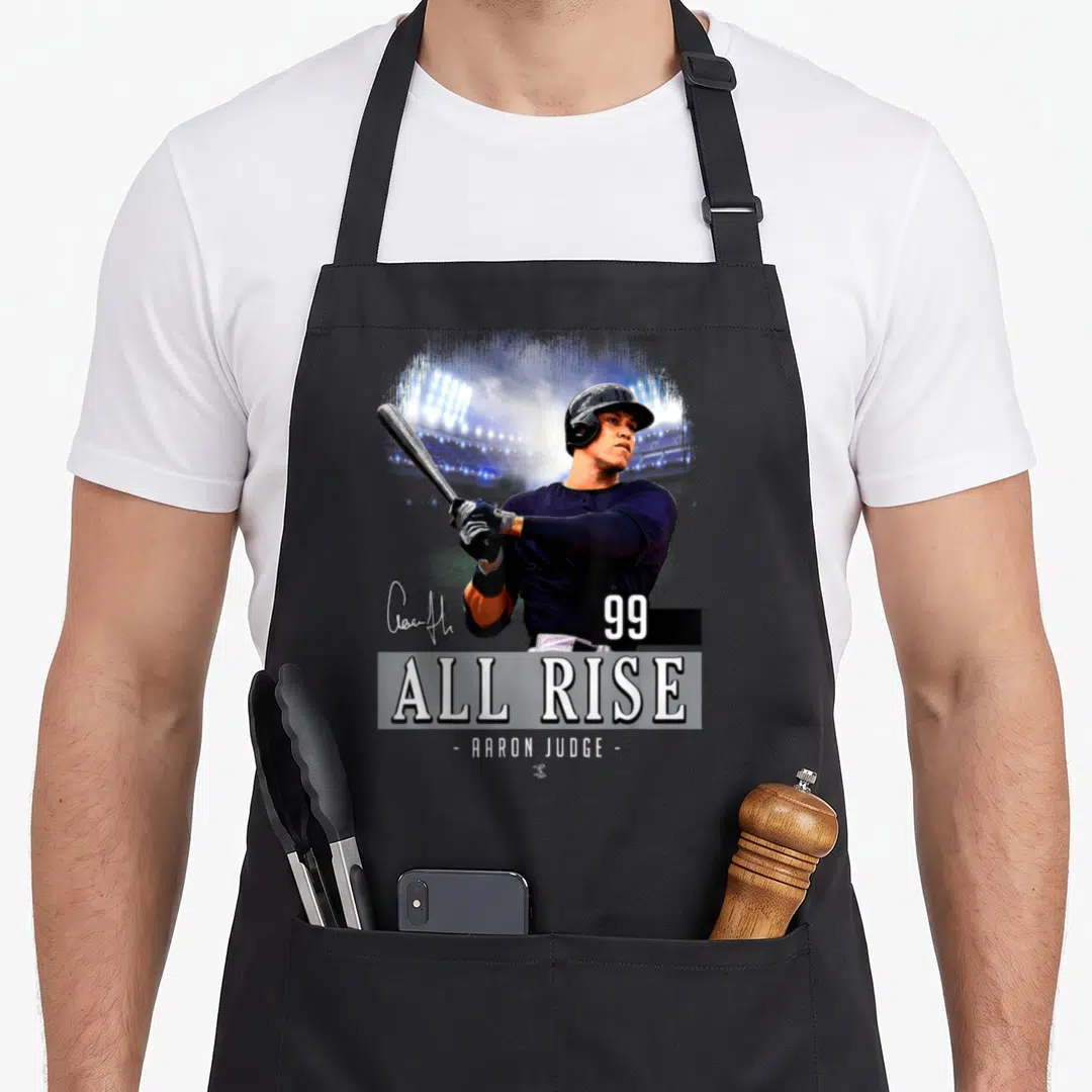 Judge rise new york apron - Aaron Judge batting photo with ALL RISE text and number 99 in navy and white — shown on a black cotton canvas apron against a white background