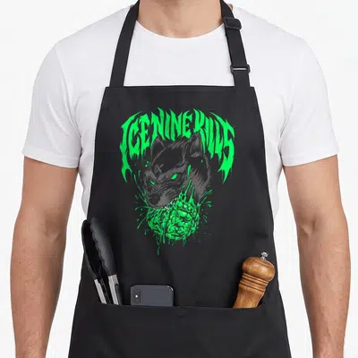 Panther ice nine kills apron - Grey wolf head with neon green slime dripping from arched ICENINEKILLS text — shown on a black cotton canvas apron against a white background