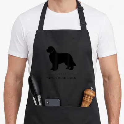 Silhouette newfoundland apron - Black dog silhouette above five stars and two lines with centered text — shown on a black cotton canvas apron against a white background