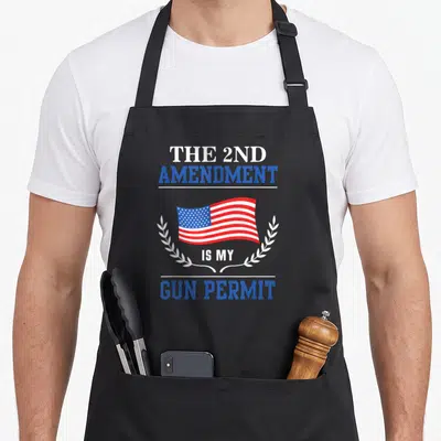 Republican 2nd apron - USA flag between white laurel wreaths with stacked blue and white text reading THE 2ND AMENDMENT — shown on a black cotton canvas apron against a white background