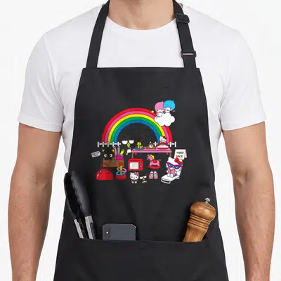 Yard hello apron - Hello Kitty characters under a rainbow with yard sale signs and vintage toys in pink, red, blue — shown on a black cotton canvas apron against a white background
