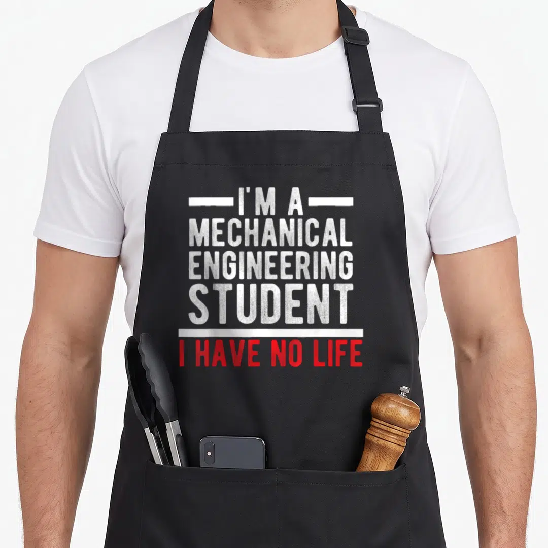 Future mechanical engineer apron - Stacked white and red text reading I'M A MECHANICAL ENGINEERING STUDENT I HAVE NO — shown on a black cotton canvas apron against a white background