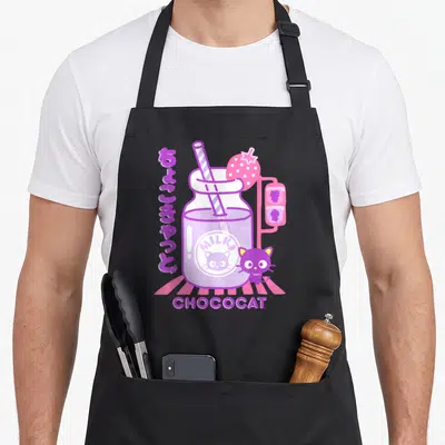 Chococat milk aprons - Purple cat next to milk bottle with Japanese text and CHOCOCAT label — shown on a black cotton canvas apron against a white background