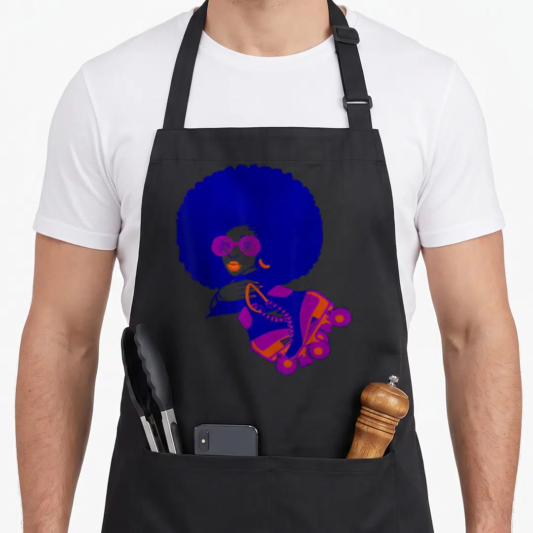 Afro roller 70s apron - Woman with blue afro and purple sunglasses holding orange and purple roller skate — shown on a black cotton canvas apron against a white background