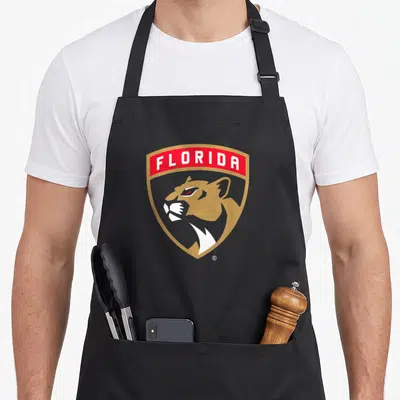 Icon florida apron - Gold shield with red banner reading FLORIDA in white above a stylized cougar head logo — shown on a black cotton canvas apron against a white background