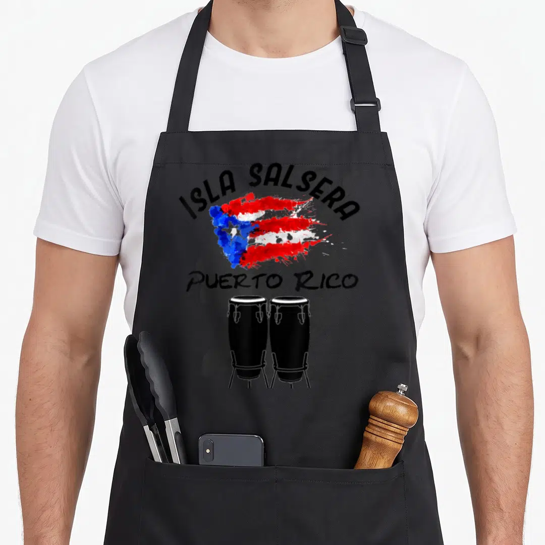 Salsa puerto pride apron - Isla Salsera text over watercolor Puerto Rico flag with two black conga drums and grey — shown on a black cotton canvas apron against a white background