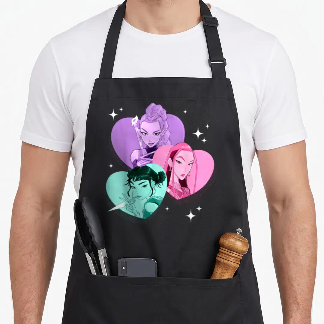 Huntrix hunting hunter apron - Three women in purple pink and teal hearts with white stars — shown on a black cotton canvas apron against a white background