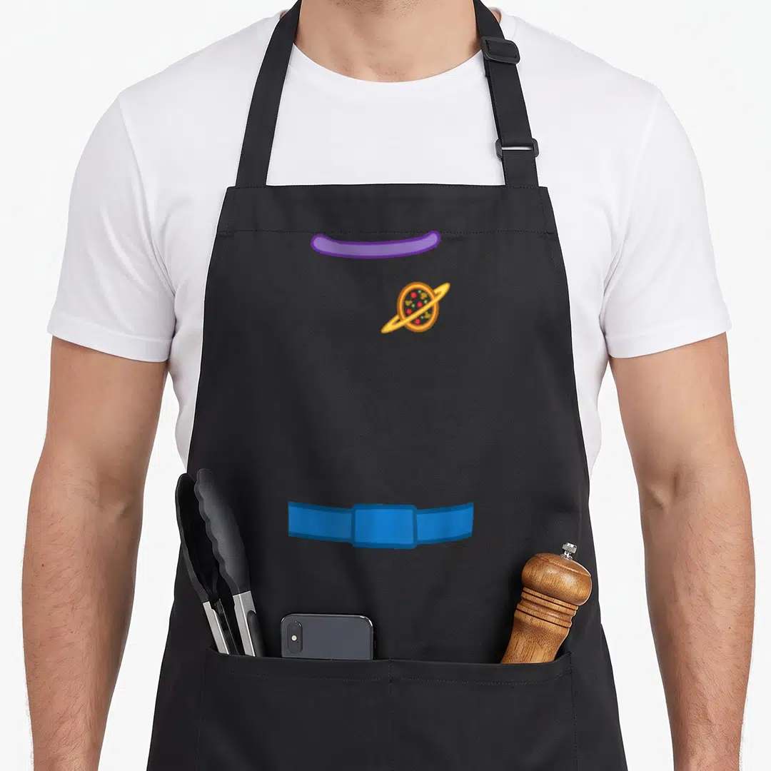 Blue halloween apron - Cartoon pizza planet graphic with purple collar and blue belt on black bib — shown on a black cotton canvas apron against a white background