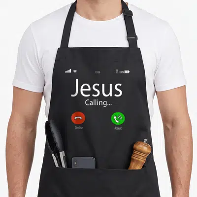 Jesus calling christmas apron - Smartphone call screen with Jesus Calling text and red decline green accept buttons — shown on a black cotton canvas apron against a white background