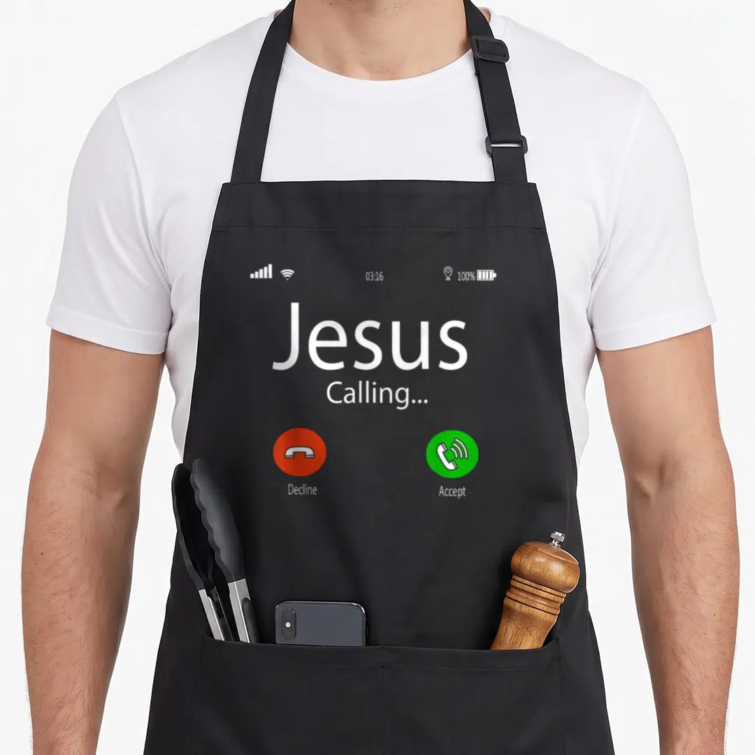 Jesus calling christmas apron - Smartphone call screen with Jesus Calling text and red decline green accept buttons — shown on a black cotton canvas apron against a white background
